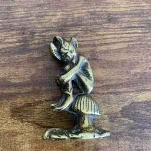 Small Brass Pixie Sitting On A Toadstool