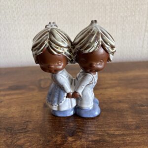 Kitsch Boy and Girl Figures Back to Back