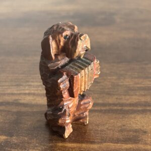 Miniature Hand Carved Wooden Dog With Accordian